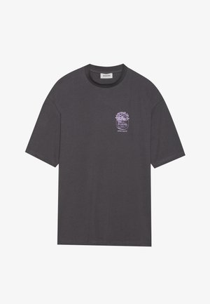 Dark gray short-sleeve t-shirt made of cotton with a lavender graphic of a flower pot and the text "OPEN DAILY" on the front.
