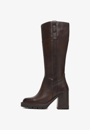 Dark brown knee-high leather boot with block heel, rugged sole, and vertical stitching detail along the shaft.