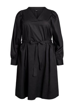 Zwarte jurk tot de knie met lange puff mouwen, V-hals, geraffineerde taille en een stoffen riem die aan de voorkant in een strik is geknoopt.