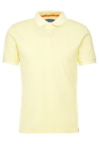 Polo giallo in tessuto di cotone, con colletto classico, patta con due bottoni e un logo discreto sul petto. Maniche corte.