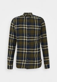 Chemise à carreaux verte et marine avec manches longues, col button-down et boutons marron sur le devant. Texture douce et tissée.