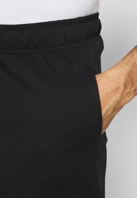 Champion Träningsshorts - black