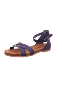 Granatowe sandały z krzyżującymi się paseczkami, zapięciem na kostkę z klamrą, korkową wkładką oraz płaską gumową podeszwą. Prosty, otwarty design.