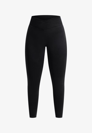 Leggings noirs avec une taille haute croisée. Fabriqués à partir d'un tissu lisse et extensible, conçus pour un confort optimal et une bonne mobilité.