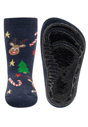 Dunkelblaue Socken mit einem Motiv aus einem Rentier, einem Weihnachtsbaum, Zuckerstangen und Sternen. Strukturierte schwarze Gummisohle für einen festen Halt.