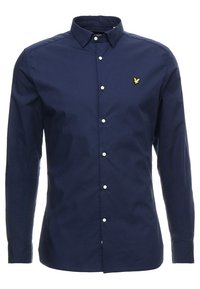 Marineblauw langemouwen shirt van katoen, met een button-down kraag en een klein geel logo op de borst; klassieke pasvorm met een gladde textuur.