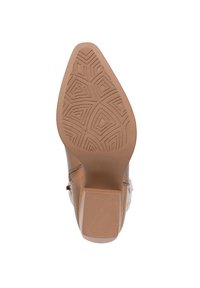 Suela de zapato de imitación de cuero marrón con forma cónica; textura de goma con patrones que presenta diseños geométricos y estrías para mayor tracción.