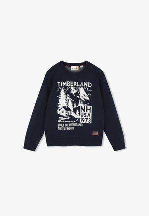 Navy blauwe Timberland trui met witte berg-, boom-, huisgrafiek en tekst "Timberland NH USA 1973 Built to withstand the elements."