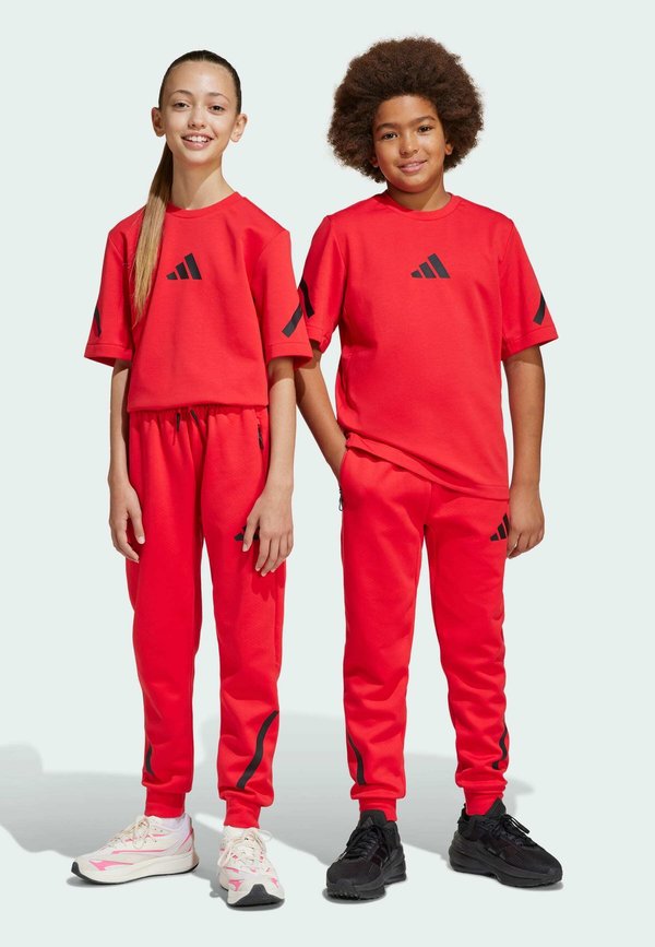 JUNIOR - Tracksuit bottoms