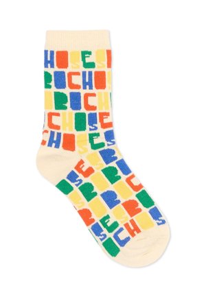 Crèmesok met kleurrijke blokletters in blauw, groen, geel en oranje die herhaaldelijk het woord "CHOICES" spellen in een patroonontwerp.