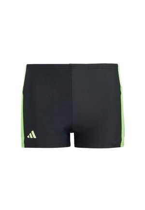 Pantaloni da nuoto neri con inserti verdi, realizzati in materiale elastico. Presentano un design minimalista con il logo Adidas sul lato sinistro inferiore.