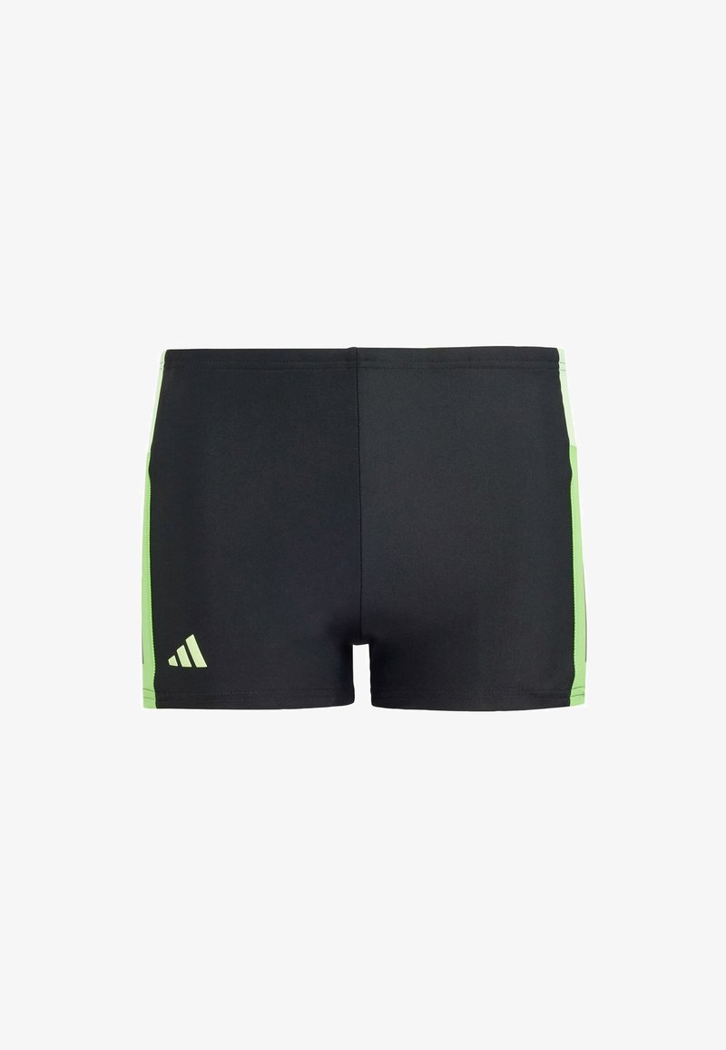 Pantaloni da nuoto neri con inserti verdi, realizzati in materiale elastico. Presentano un design minimalista con il logo Adidas sul lato sinistro inferiore.