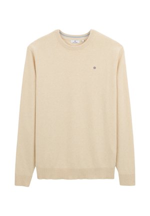 Pull beige en tissu doux, doté d'un col rond, de manches longues, de poignets et d'un ourlet côtelés, avec un petit logo sur la poitrine.