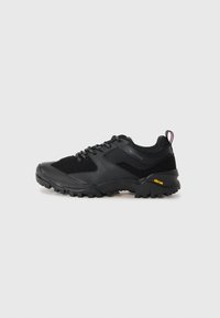 Black hiking shoe with mixed materials, featuring a textured upper, reinforced toe cap, Vibram sole, and lace-up design.