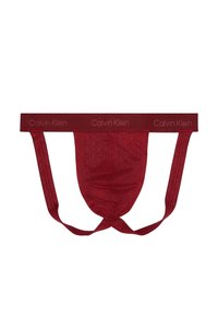 Bordeauxkleurige Calvin Klein heren jockstrap met merkband en mesh stofpouch, ontworpen voor ondersteuning en ventilatie.