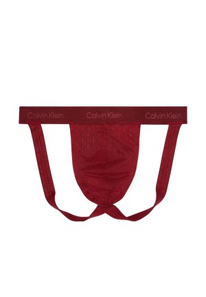 Jockstrap pour homme Calvin Klein en bordeaux avec une ceinture logotypée et une pochette en tissu maille, conçu pour le soutien et la ventilation.