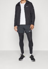 Nike Performance Windbreakers - black