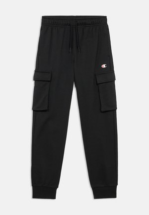 Black cargo pants with a drawstring waist, featuring two side pockets and a small logo on the left thigh. Soft, knit fabric texture.