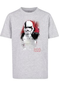 Pilkas medvilnės marškinėliai su „Stormtrooper“ grafika raudono purslų fono fone, apačioje raudonais žodžiais „Star Wars“. 
