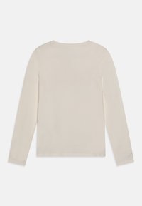 Acquista Guess Maglietta Slim Triangolo Big Floreale Su