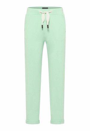 Mint green sweatpants feature an elastic waistband with a drawstring, two side pockets, and rolled cuffs at the ankles. Soft fabric texture.