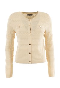 Cardigan lavorato a maglia color crema con intricati motivi a diamante e pizzo, bottoni frontali, due tasche sul petto con alette e maniche lunghe.