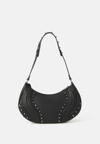 Black leather handbag with a curved shape, textured surface, decorative studs along the sides, and a short, studded shoulder strap.