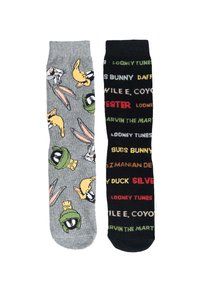 Calzini grigi e neri con i personaggi dei Looney Tunes. Il calzino grigio presenta motivi di Bugs Bunny e Marvin il Marziano; il calzino nero include un testo colorato.