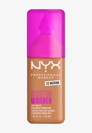 Make 'Em Wonder Foundation in einer braunen Flasche mit pinkem Deckel. Das Etikett zeigt weißen und pinken Text; Volumen ist 30 ml, Farbton ist 22 Medium.