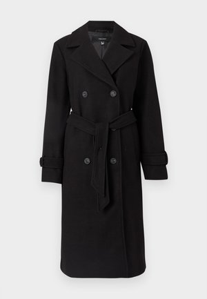 Manteau trench noir à double boutonnage fabriqué en tissu de laine texturé. Il dispose de grands boutons, d'une taille ceinturée et d'un col à revers classique.