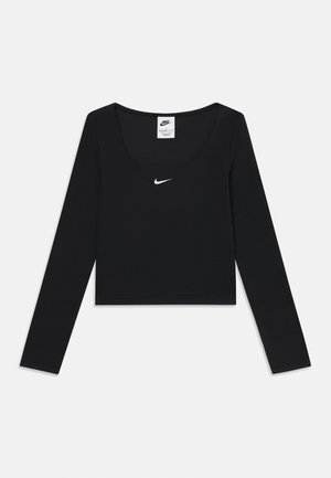 Sort langærmet crop top lavet af blødt stof, med en rund halsudskæring og et lille hvidt Nike-logo centreret på brystet.