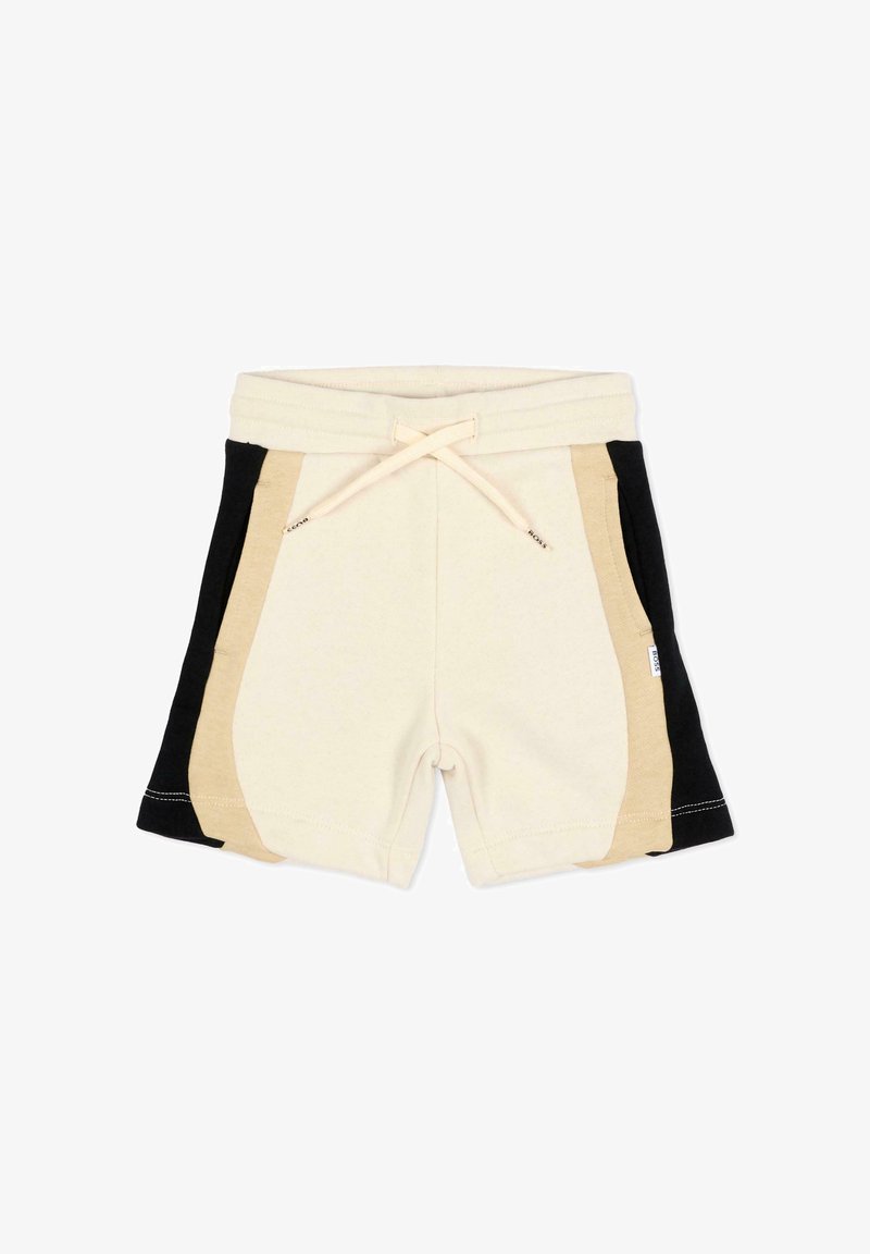 Short beige avec des panneaux latéraux noirs et marron clair, une taille élastique et un cordon de serrage à l'avant.