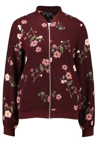 Veste bomber bordeaux avec un motif floral, ornée de fleurs roses et crème, fermeture éclair, col et poignets côtelés. Texture de tissu douce.
