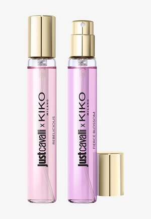 To slanke parfymespray-flasker, en rosa merket "Rebelicious" og en lilla merket "Fierce Blossom", begge med gullokker.