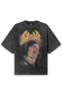 Black oversized t-shirt featuring a front graphic of a face in vibrant yellow and pink tones, with drips and text at the bottom.