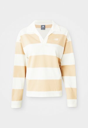 Polo à manches longues en rayures blanches et beige clair. Doté d'un col, d'un tissu doux et d'un petit logo sur la poitrine gauche.