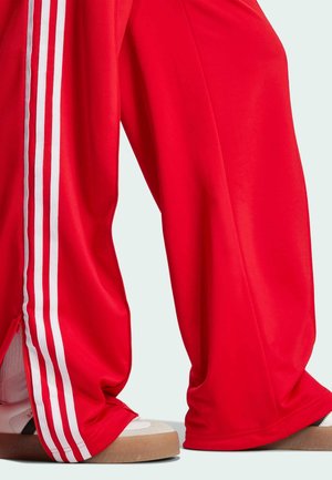 adidas Originals FIREBIRD - Tracksuit bottoms - better scarlet   white