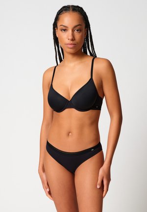 Schwarzes BH- und Bikini-Set aus glattem Stoff, mit dünn verstellbaren Trägern, geformten Cups und einem dekorativen Band an der Unterwäsche.