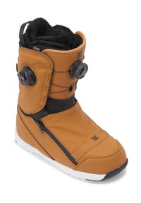 Bota de snowboard marrón con un exterior texturizado, forro de felpa negra, sistema de cordones Boa y una cremallera lateral. Suela de goma para tracción.