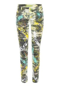 Jean skinny avec un motif camouflage agrémenté de touches de peinture jaune, turquoise et blanche ; détails cloutés le long des coutures latérales.