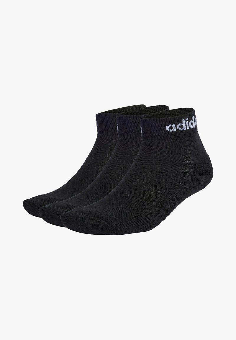 Črne anatomske nogavice, set treh kosov, narejene iz mešanice bombaža, z rebrastim robom in belim logotipom "adidas" na vrhu.
