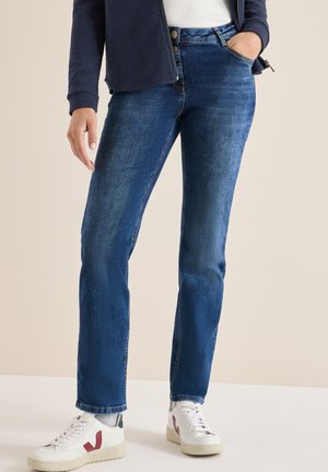 - Jeansy Slim Fit
