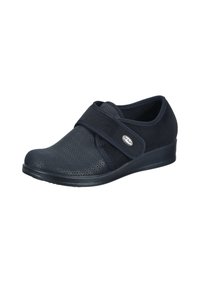 Scarpa casual nera in materiale mesh con cinturino Velcro, design sagomato, punta arrotondata e tacco leggermente elevato per il comfort.