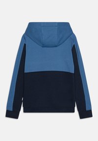 Sudadera con capucha en azul y marino, con un diseño de color bloque. Fabricada con un tejido suave y de textura lisa. Puños y dobladillo acanalados.