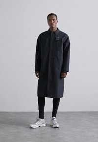 MM6 Maison Margiela SALOMON - Casaco impermeável - black