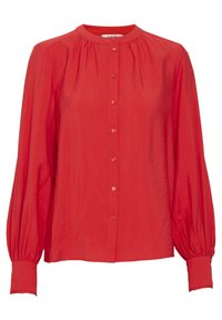 Rotes Langarmshirt mit rundem Ausschnitt, durchgehender Knopfleiste und gerafften Details an den Schultern und an den Bündchen. Glatte Stoffoberfläche.