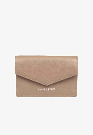 Taupe, textured leather wallet with an angled flap closure. Features embossed "LANCASTER PARIS" logo in white on the front. Compact design.