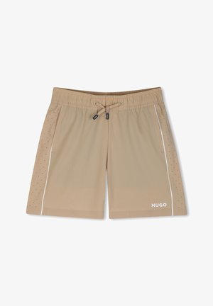 Shorts de bain homme beige avec ceinture élastique et cordon de serrage, panneaux latéraux perforés, poches latérales, et logo blanc "HUGO" sur la jambe gauche.