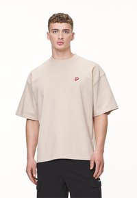 Pegador LEONO BOXY TEE - Základné tričko - washed desert sand