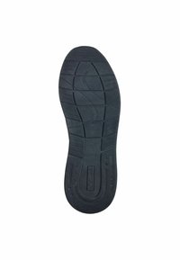 Semelle de chaussure en caoutchouc noir avec des motifs de semelle texturés et des sections surélevées ; présente un logo circulaire et un indicateur de taille "42" près du talon.